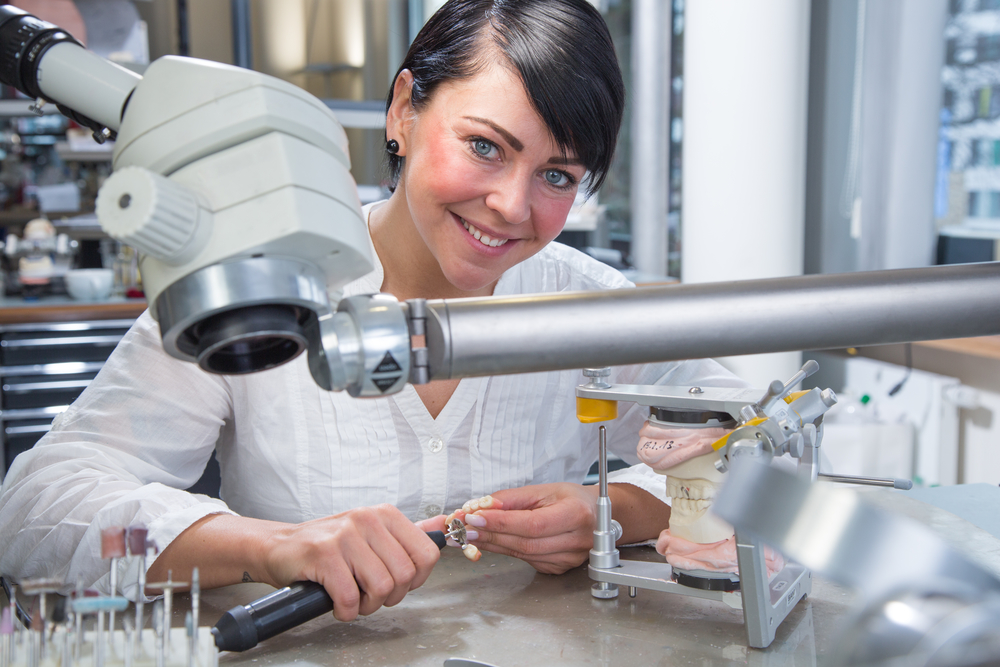 Women extracting dental scrap